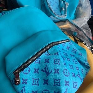 Louis Vuitton Bookbag & Travelbag